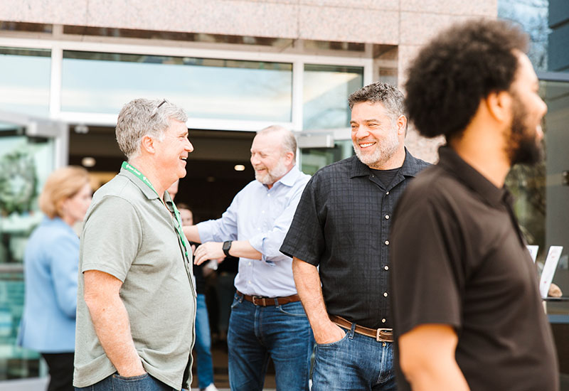 photo of employees gathering